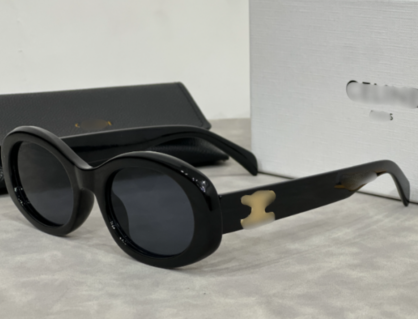 DESIGNER SUNGLASSES